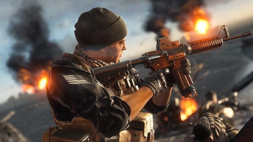 Battlefield character firing an assault rifle