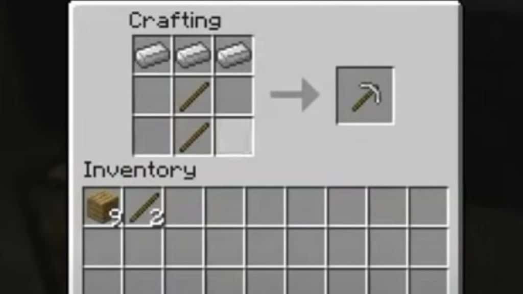 An iron pickaxe recipe in Minecraft.