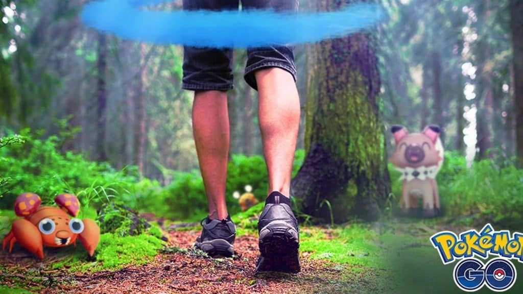 A Pokemon Go trainer walking in the woods