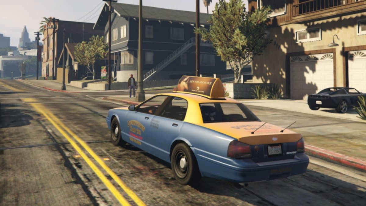 gta online taxi cab driving down road