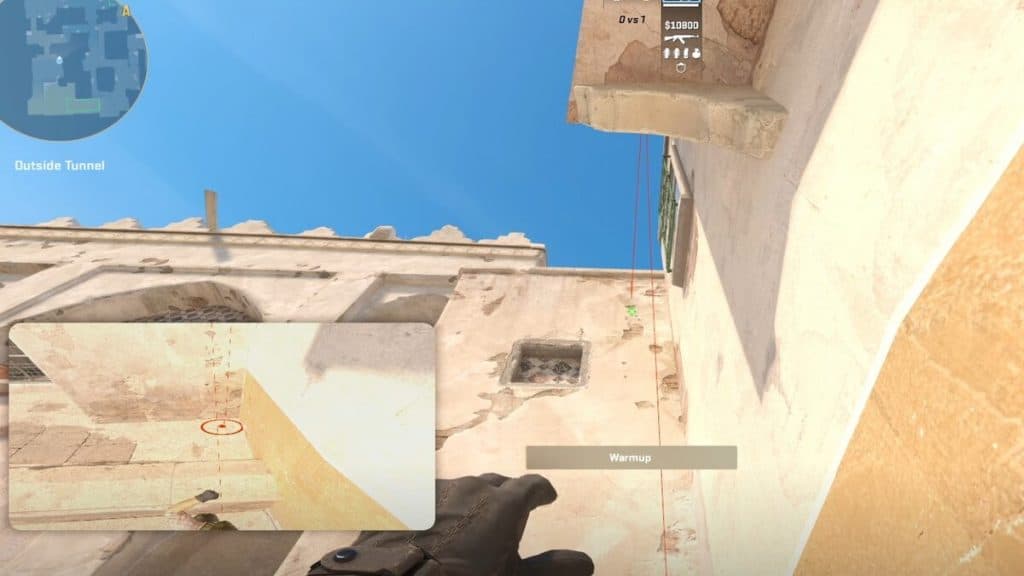 Holding a B door smoke lineup on Dust 2 in CS2