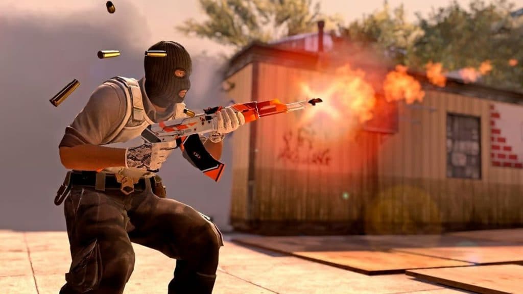 Terrorist in CS2 firing AK-47 in Overpass's B Site