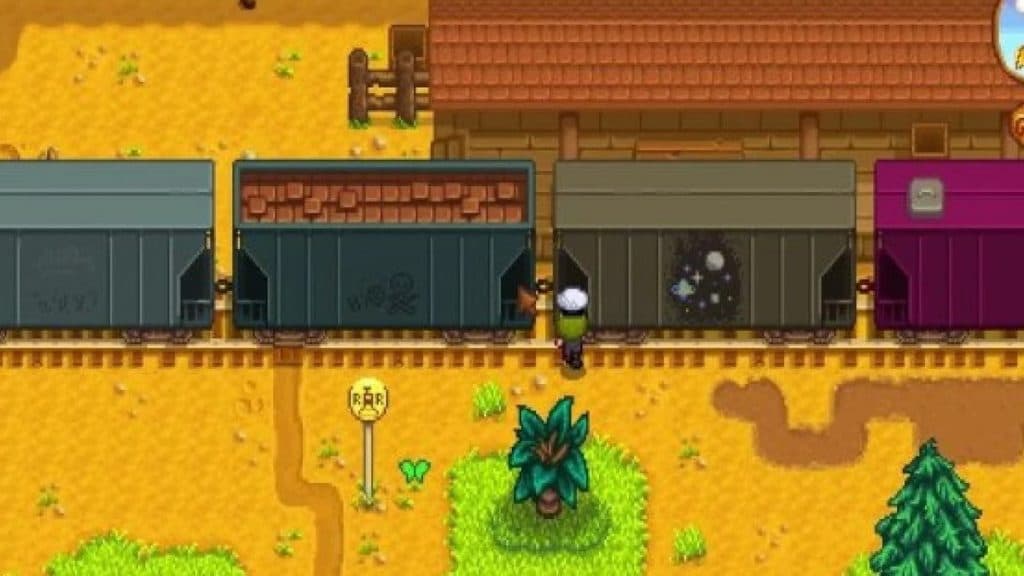 Player near a train in Stardew Valley