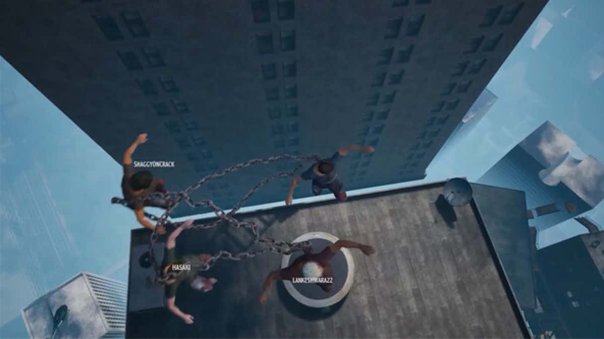 Chained Together players jumping on a platform